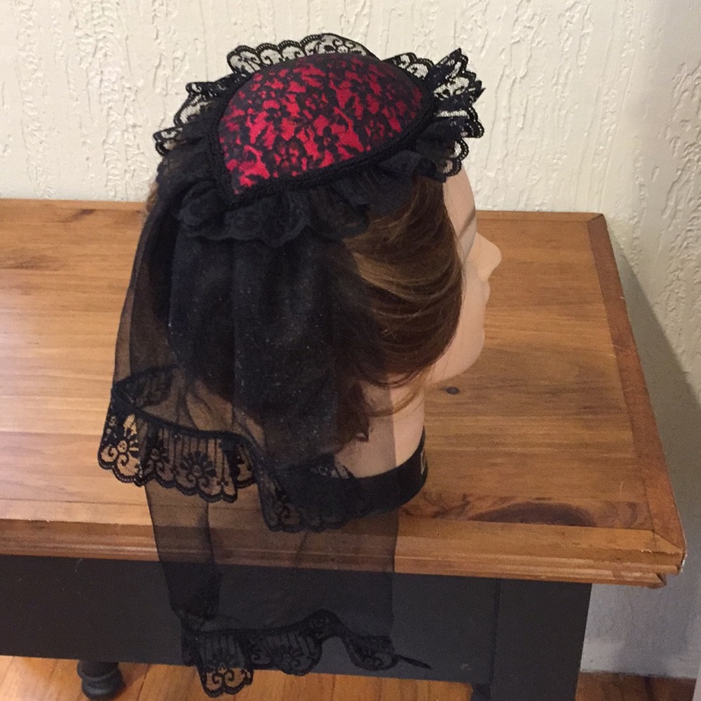 Red satin and lace veiled Fascinator